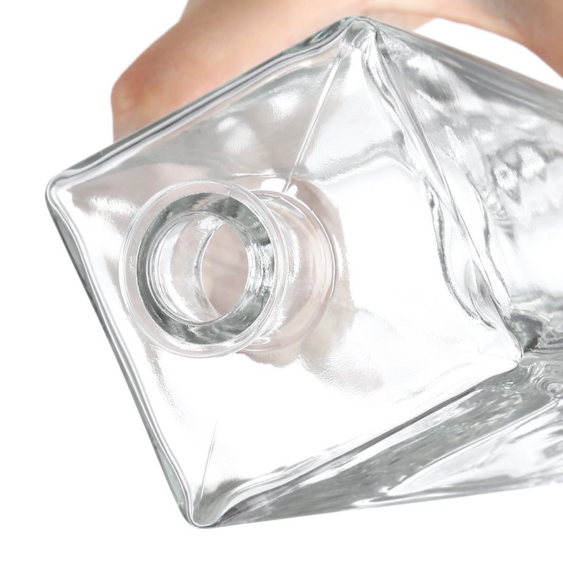 engraved whisky glass and bottle
